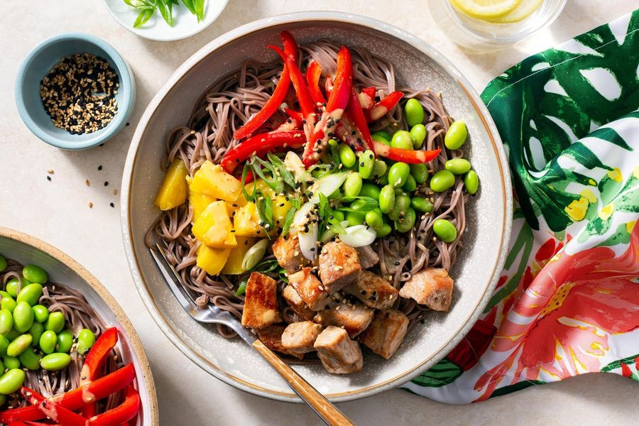 Fast Hawaiian noodle bowls with pork, pineapple, and edamame