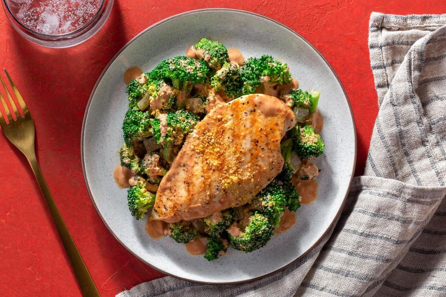 Roasted chicken breast with sun-dried tomato sauce and broccoli