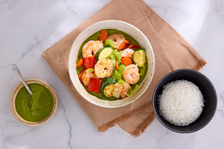 Spicy Thai green curry with jasmine rice, zucchini, and bell pepper