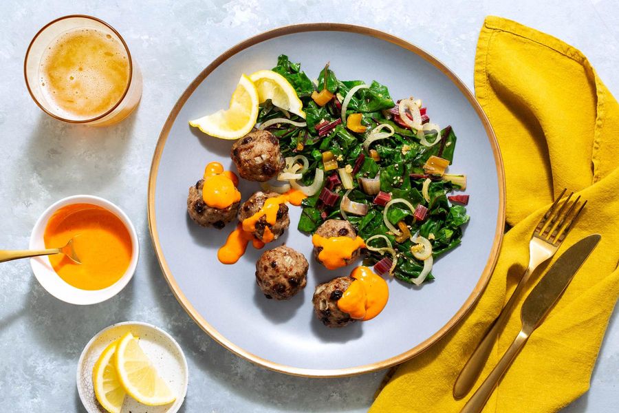 Mediterranean meatballs with chard and red pepper–cashew crema