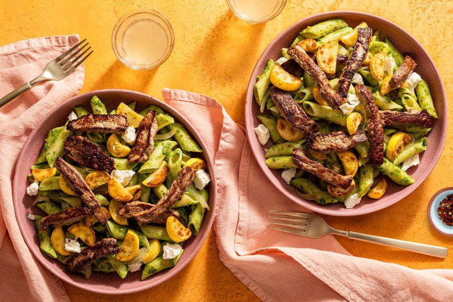 Top sirloin steak strips with penne, squash, and sweet pea pistou