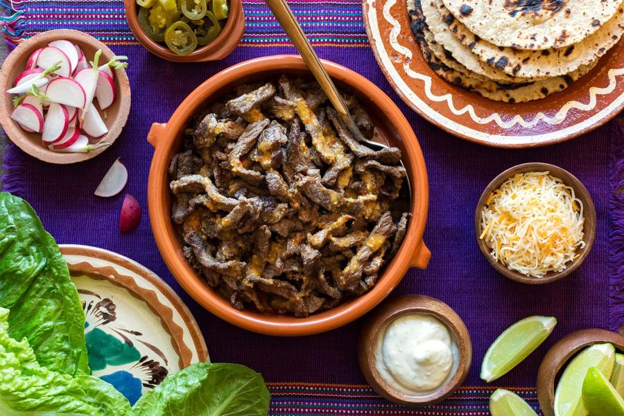 Mojo-marinated carne asada fajitas with lime yogurt