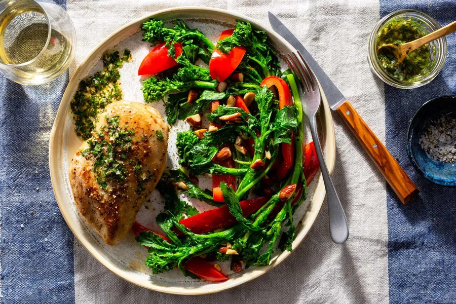 Sicilian chicken breasts with salmoriglio sauce and broccoli rabe