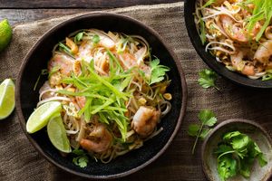Shrimp pad thai with rice noodles and sugar snap peas