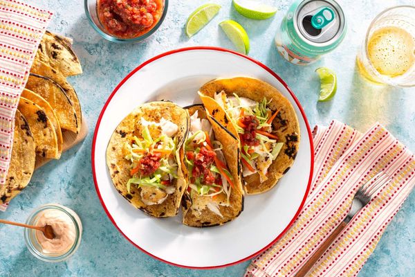 Salmon tacos with cabbage slaw, salsa roja, and chipotle yogurt