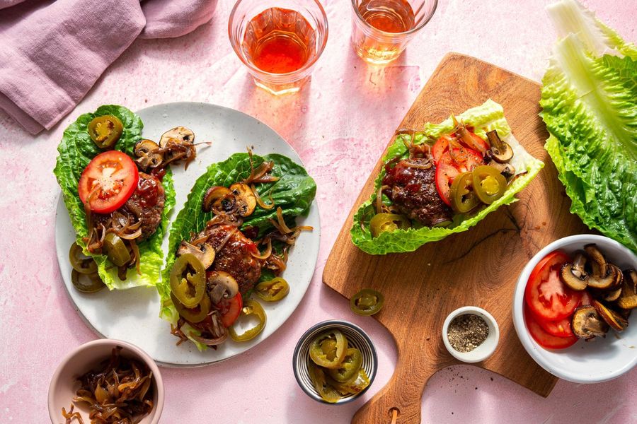 Lettuce-wrapped “sliders” with BBQ glaze and caramelized onions