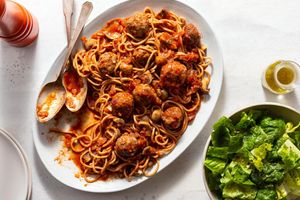 Spaghetti and meatballs with mushroom marinara and Italian salad
