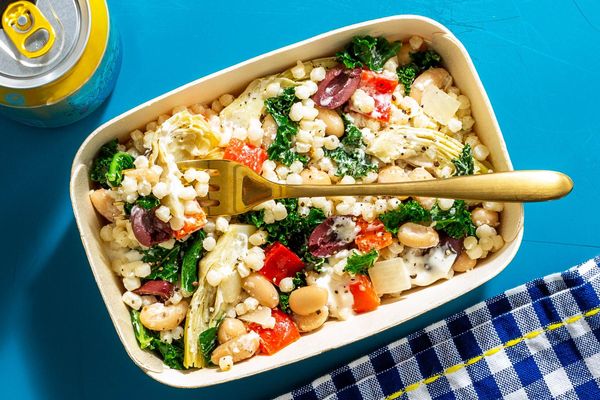 Vegetarian couscous with artichokes, olives, and creamy feta dressing