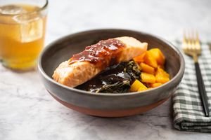 Maple salmon over braised greens