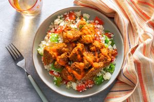 Jerk chicken with coconut cauliflower and roasted red pepper sauce
