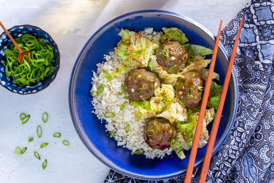 Chinese BBQ meatballs with cabbage and char siu sauce over cauliflower “rice”