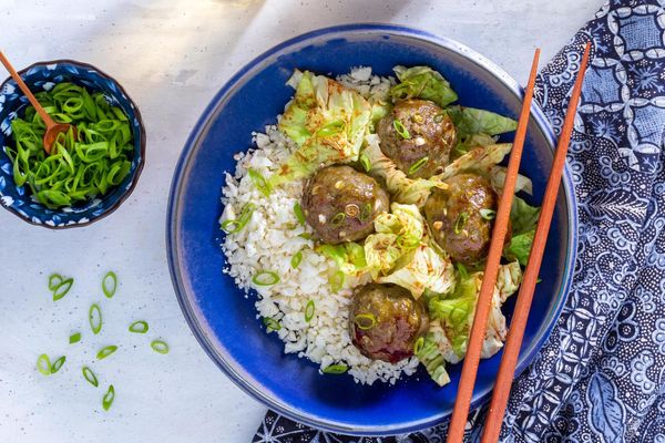 Chinese BBQ meatballs with cabbage and char siu sauce over cauliflower “rice”