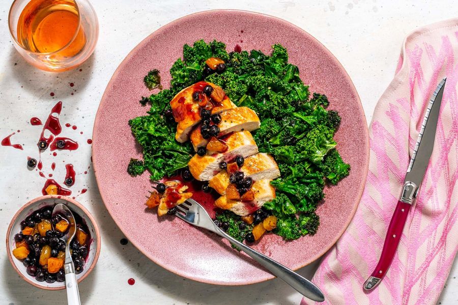 Blueberry-apricot sauce over your choice of protein and sautéed kale