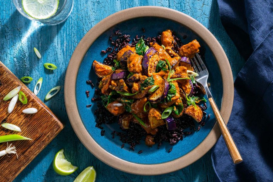 Spicy Indonesian chicken and eggplant rendang with coconut black rice