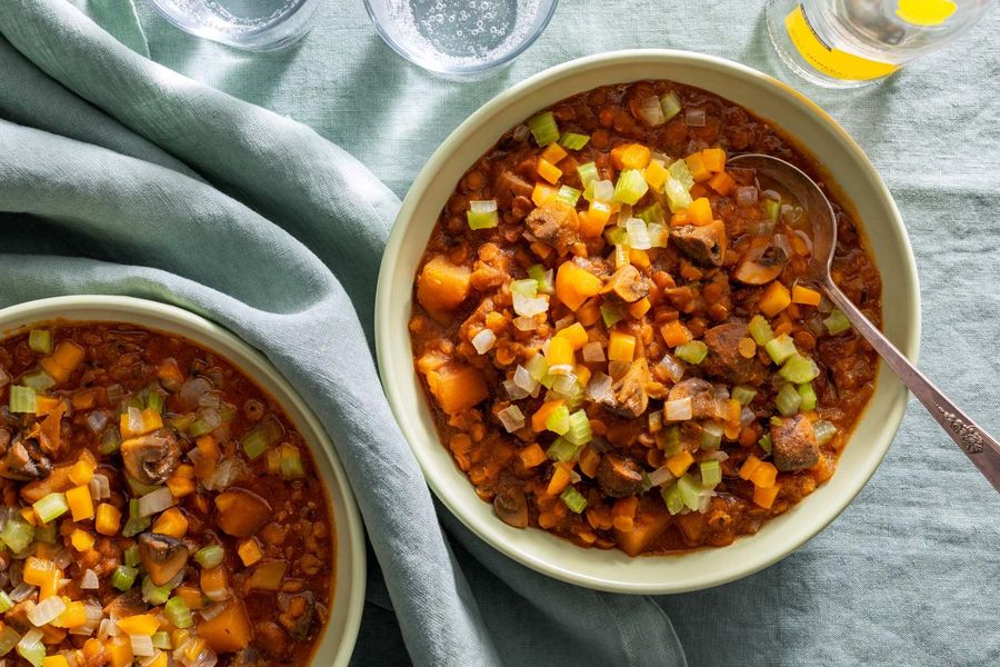 Plant-based Irish stew with lentils, mushrooms, and root vegetables