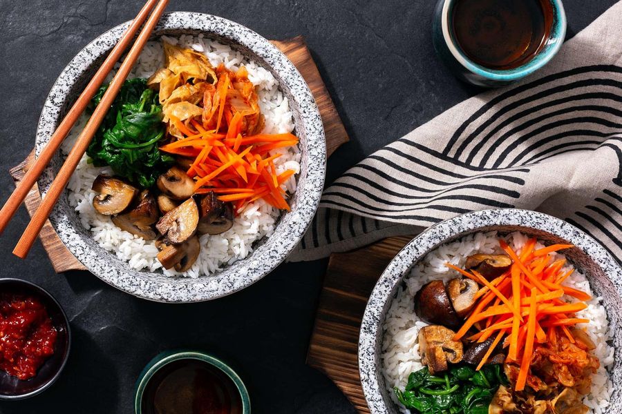 Spicy bibimbap with tamari mushrooms, kimchi, and yuba noodles