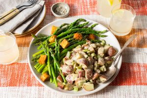 Warm potato salad with roasted asparagus, mustard vinaigrette, and tempeh croutons