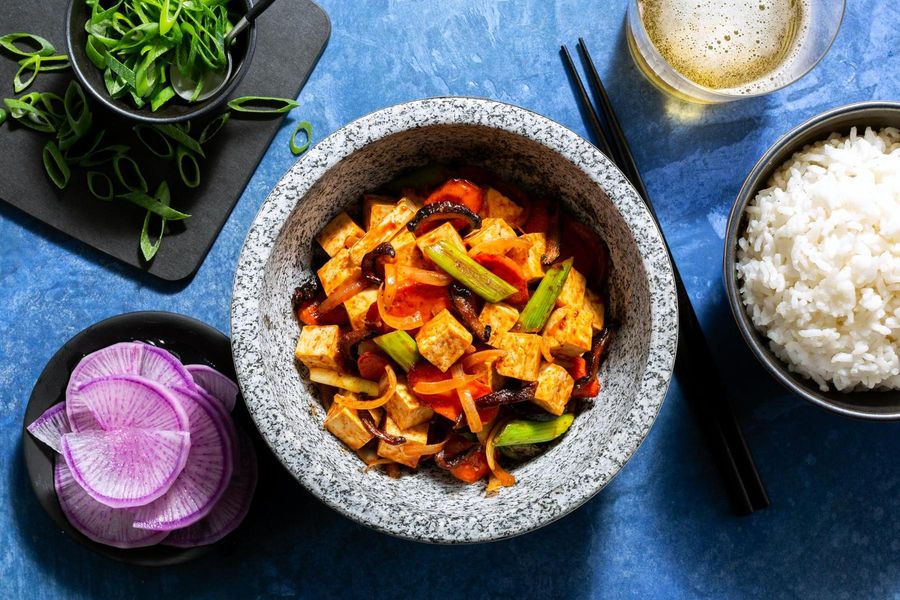 Korean spicy stir-fry with your choice of protein and pickled daikon