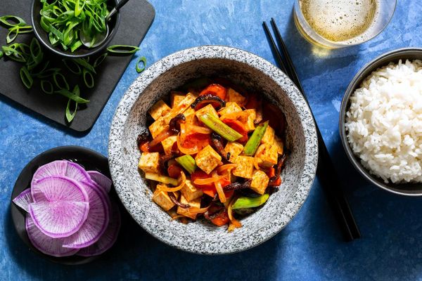 Korean spicy shrimp stir-fry and pickled daikon
