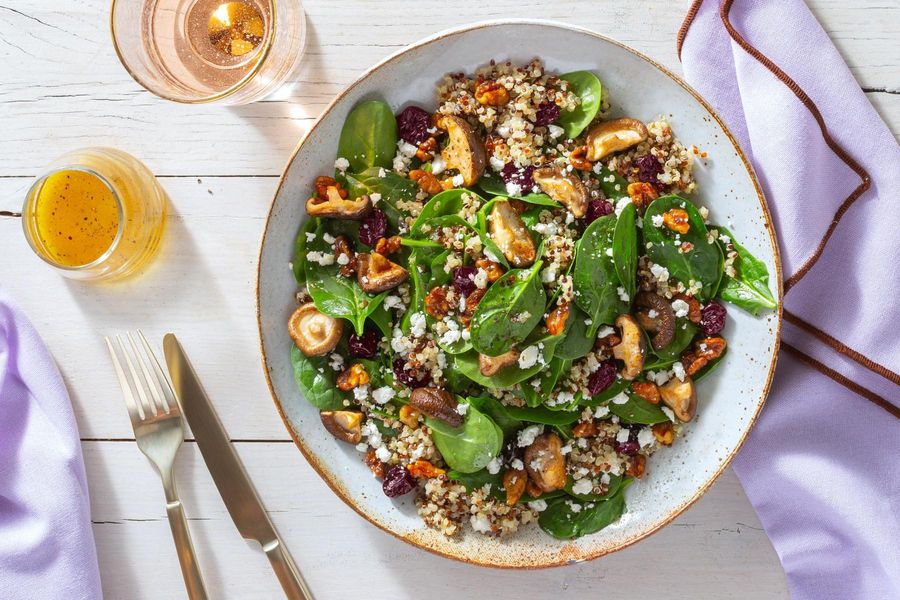Warm quinoa salad with spinach, shiitakes, and honeyed walnuts