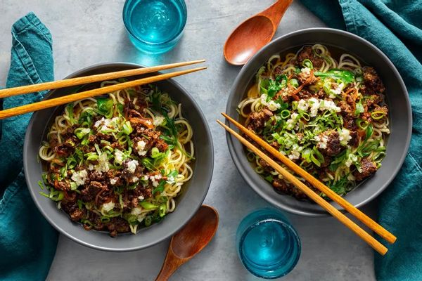 Taiwanese noodle soup with ground pork and baby greens