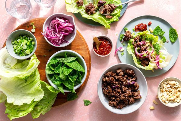 Thai chicken larb lettuce cups with scallions, cashews, and fresh mint
