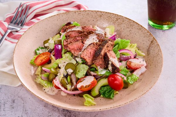 Pastrami-spiced steak salad with pickled vegetables and rémoulade