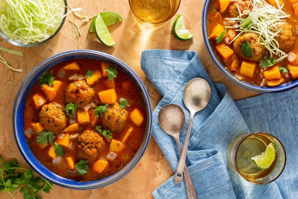 Spicy Mexican meatball soup with butternut squash, cabbage, and cilantro