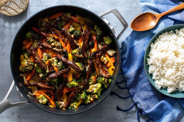 Hot and sour chicken stir-fry with vegetables and long-grain rice
