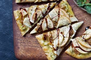 Apple and Brie flatbreads with roasted garlic pesto and arugula salad