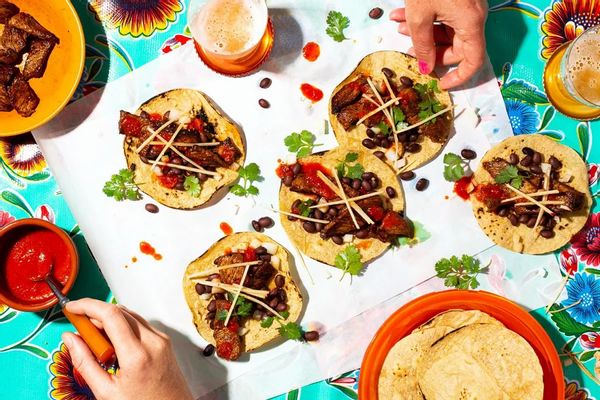 Smoky chicken tacos with black beans and chile-lime salsa