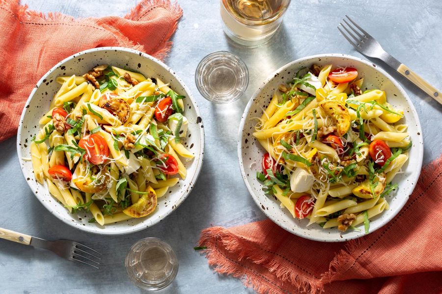 Penne rigate with yellow squash, tomatoes, and fresh mozzarella