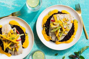 Sole over black rice with zesty mango-radish slaw