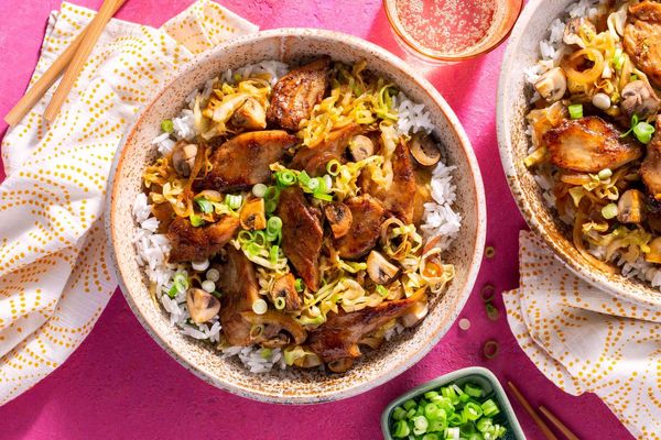 Five-spice pork stir-fry with cabbage and mushrooms over jasmine rice