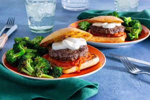 Wagyu pizza burgers with marinara, fresh mozzarella, and roasted garlic