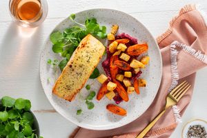 Orange-glazed salmon with root vegetables and cashew-beet smear
