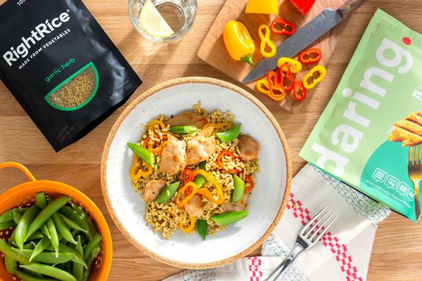 RightRice Bowls With Plant-Based Chicken, Snap Peas, and Peppers