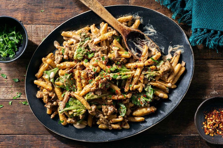 Ricotta cavatelli with sausage, porcini, and pine nuts