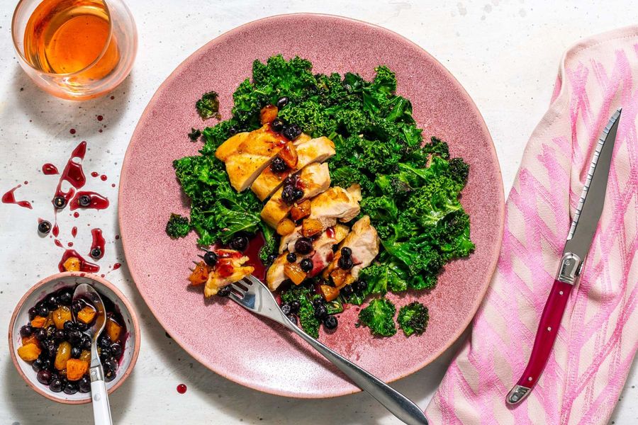 Blueberry-apricot sauce over your choice of protein and sautéed kale