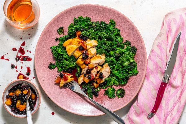 Blueberry-apricot pork chops with sautéed kale