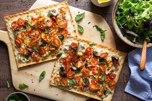 White bean-ricotta pizzettas with tomato and basil
