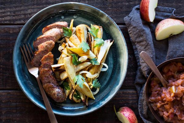 Italian sausages with apple compote and roasted parsnips