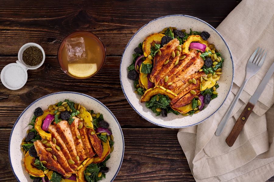Kale salad with your choice of protein, squash, and dried cherries