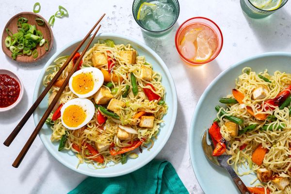 Hakka noodles with stir-fried vegetables and soft-cooked eggs