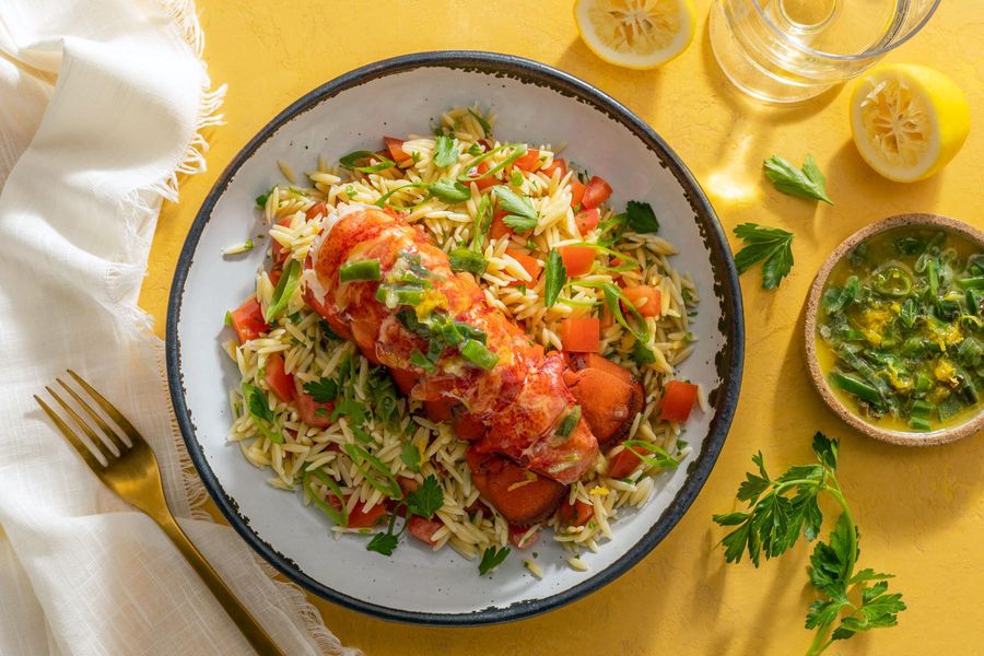 Lobster tails with garlic-scallion butter and fresh tomato orzo