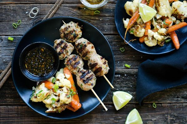 Yakitori style chicken meatballs with roasted vegetables & miso butter