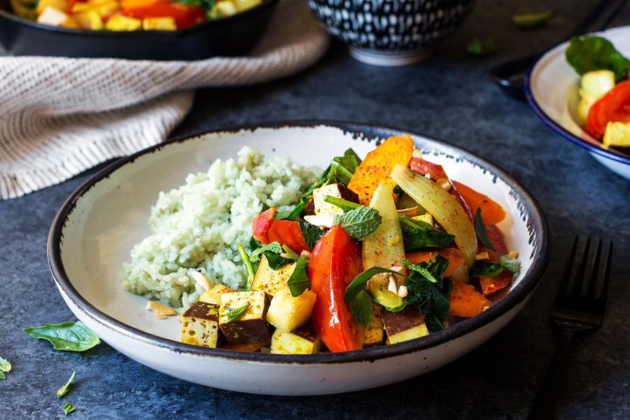 Southeast Asian vegetable stir-fry with jade rice and roasted cashews