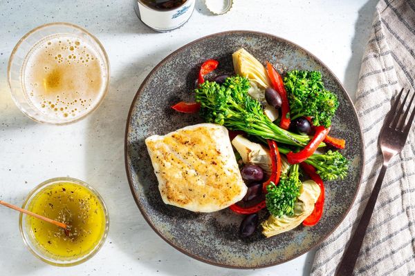 Mediterranean lemon chicken with baby broccoli, artichokes, and olives