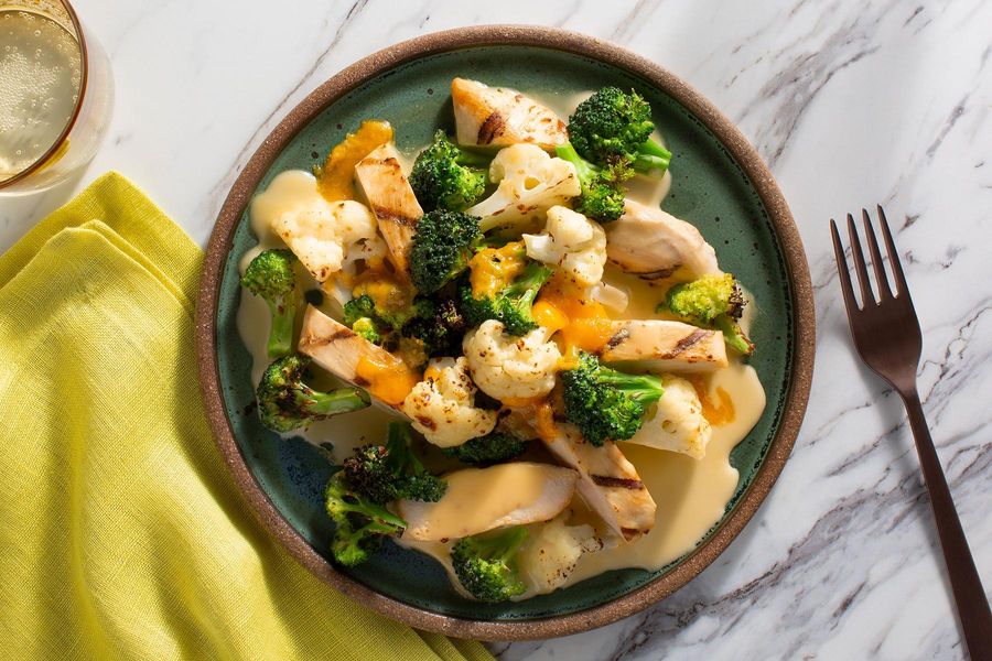 Grilled chicken and vegetables with triple cheese sauce