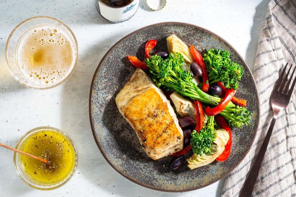 Mediterranean lemon chicken with baby broccoli, artichokes, and olives